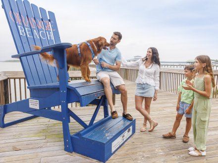 Family at the Waterfront Pair Pier Adirondack chair, photo spot in Orange Beach