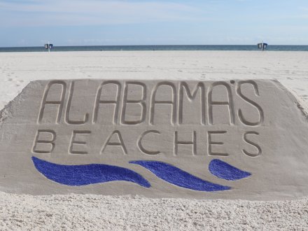 Custom Alabama's Beaches sandcastle made by Sand Castle University in Gulf Shores