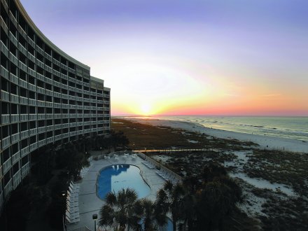Island House Hotel in Orange Beach at sunset