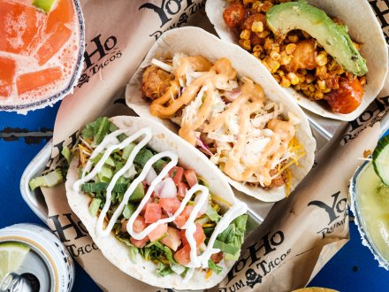 A basket of tacos from Yoho Rum & Tacos mexican restaurant in Orange Beach