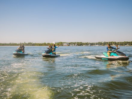 Friends on Jet Skis in the back bays of Orange Beach