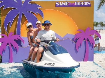 Festival goers at a Sand in My Boots photo op