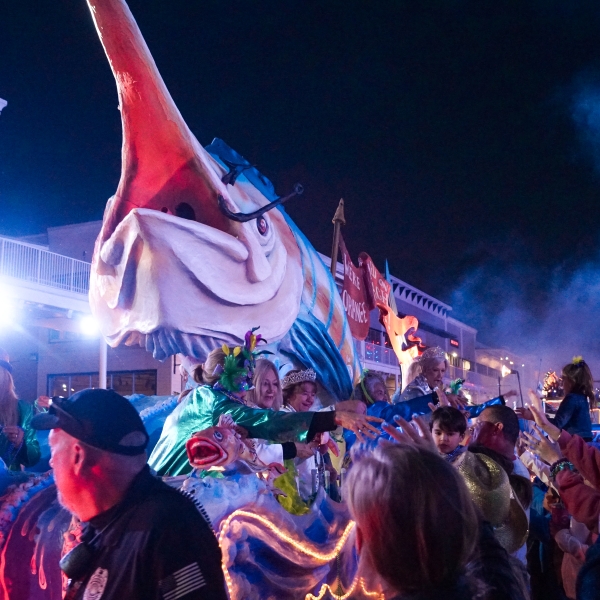 Giant marlin float at Moon Pies on Main Mardi Gras parade at The Wharf
