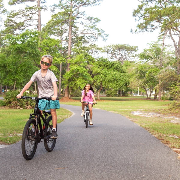 Children biking in the Gulf State Park