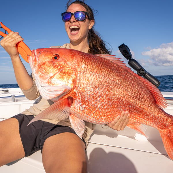 Woman fishing on Alabama's Beaches