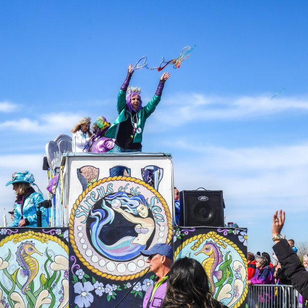 People enjoying Mardi Gras parades on Alabama's Beaches during winter