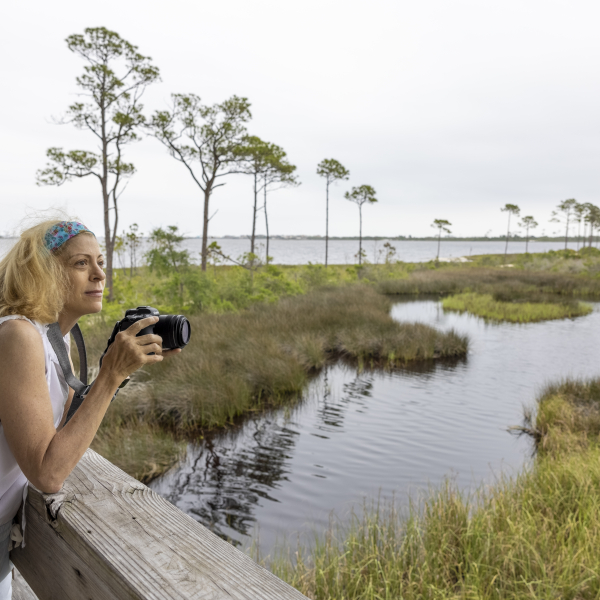 Person enjoying the Pine Beach Trail on Alabama's Beaches