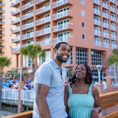 Couple enjoying a walk on the pier at Perdido Beach Resort