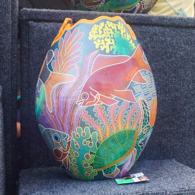 Handmade piece of pottery on display at the Orange Beach Festival of Art