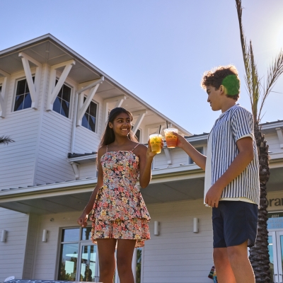 Friends enjoying a drink at The Wharf Portside on Alabama's Beaches