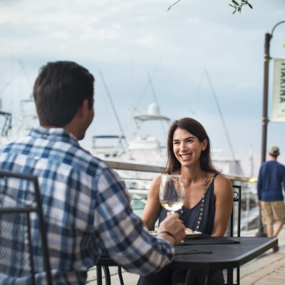 Local couple enjoying food together at Ginny Lane Bar & Grill