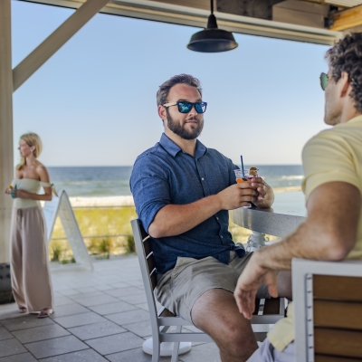 Meeting attendees enjoying a drink at CoastAL on Alabama's Beaches