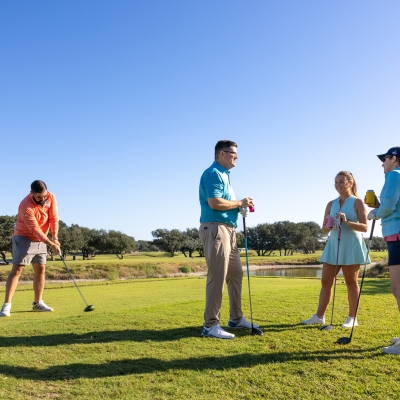 Friends golfing at Kiva Dunes Golf Resort in Fort Morgan