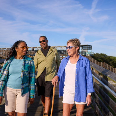 Snowbirds walking and enjoying winter on Alabama's Beaches