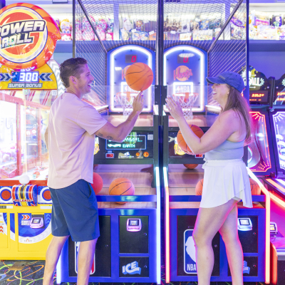 A couple playing at The Track arcade