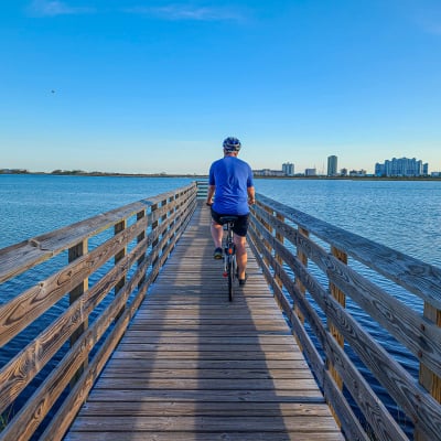 Person biking in the Gulf State Park
