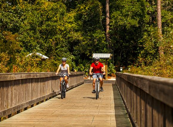 Couples cycling in Gulf Shores