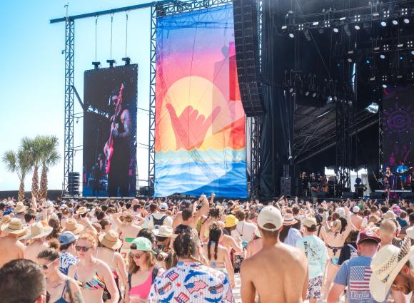 Crowd at Sand in My Boots beach music festival in Gulf Shores
