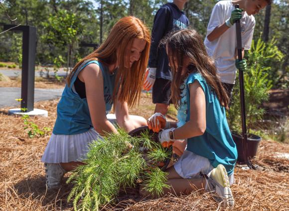 Children learning about native plants at the Gulf Coast Eco Center