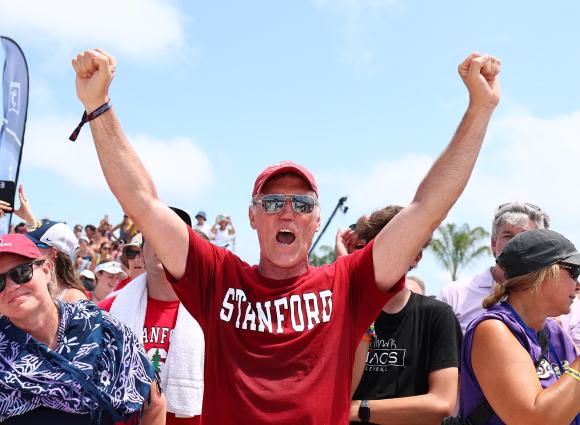 Fan cheering at the NCAA Beach Volleyball Championship in Gulf Shores