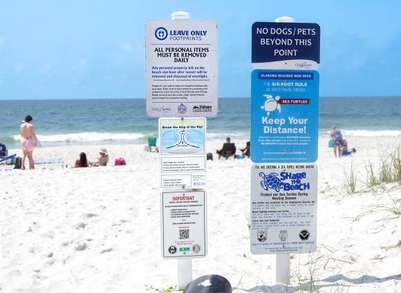LOF signs on the beach