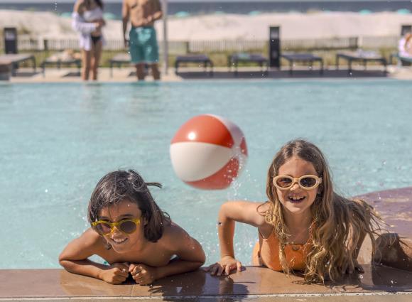 Kids playing in the pool at The Lodge
