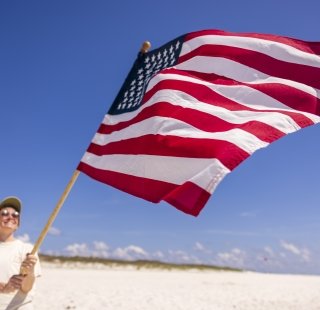 American flag on the beach in orange beach
