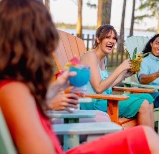 Friends enjoying a summer time drink at GT's on the Bay