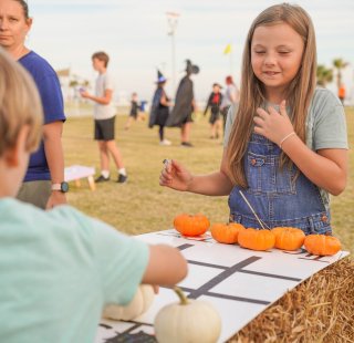 Halloween kids playing a game
