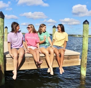 Kids in their Alabama's Beaches merch