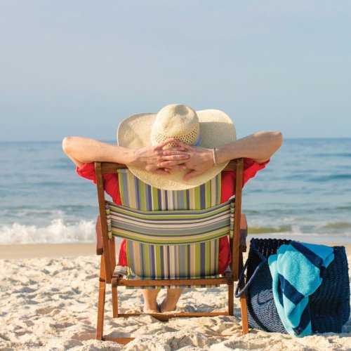 Woman relaxing on the beach in Alabama