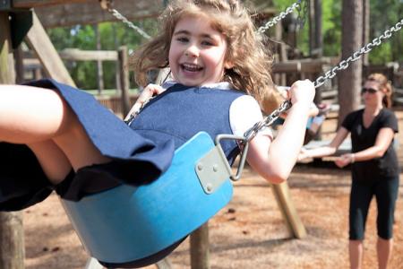 Girl on swing set