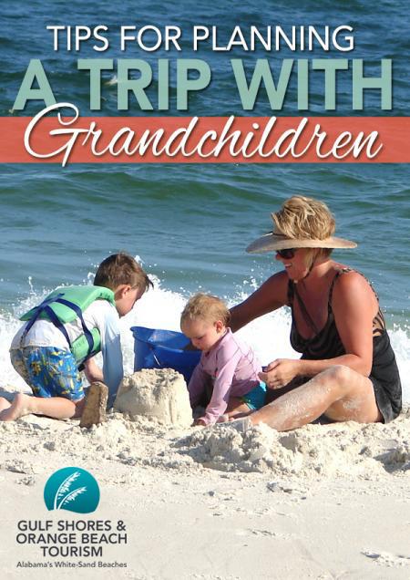 Grandmother with Grandchildren playing in the sand on Alabama's Beaches