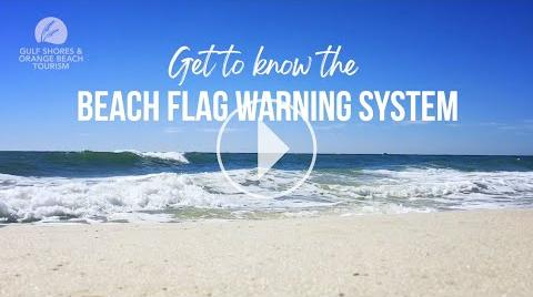 Play the video titled What do Beach Flags Mean? | Beach Flag Warning System in Gulf Shores & Orange Beach, AL